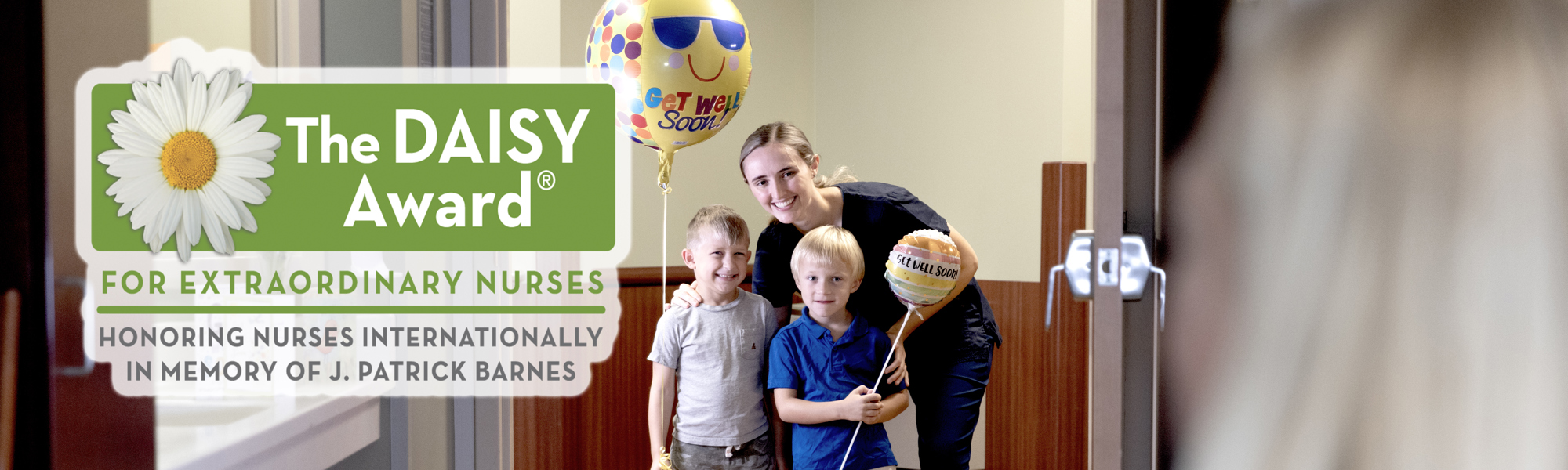 Nurse with Two children visiting loved one in hospital